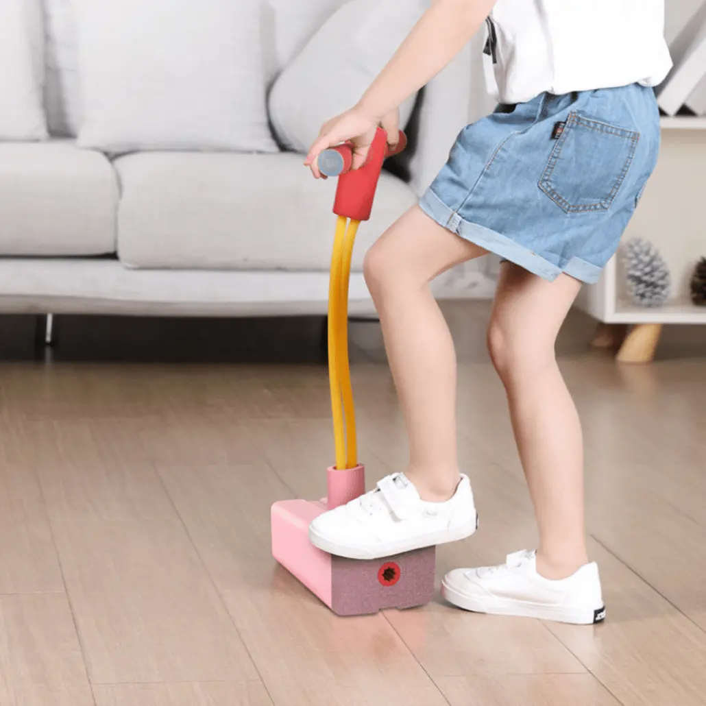 Jucarie Elastica din Spuma Pogo Stick cu Sunete Squeaki, 20x40x8 cm, Roz, +3 Ani